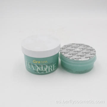 Crema de masaje exfoliante para la piel con geranio